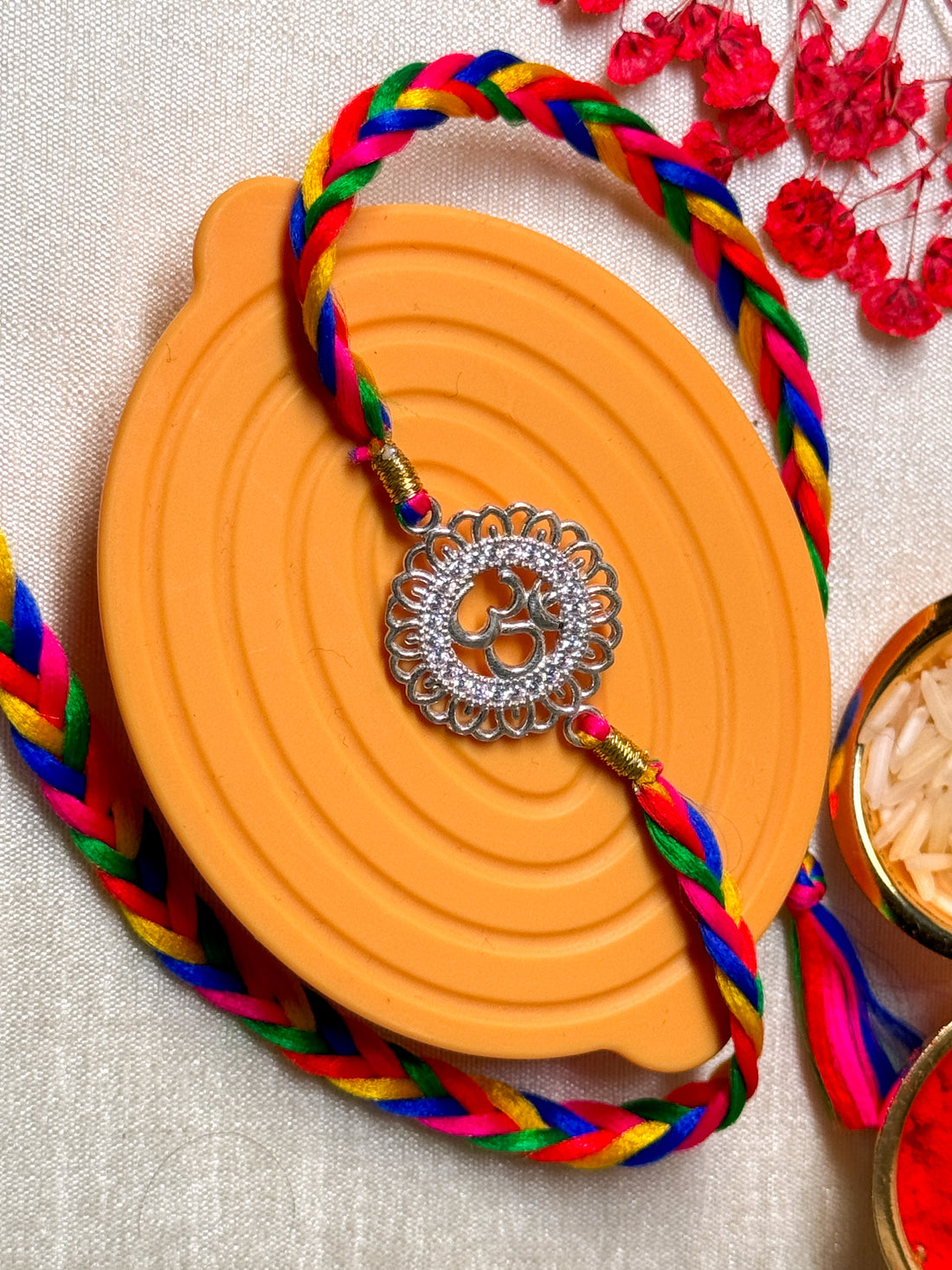 AUM IN FLOWER RAKHI