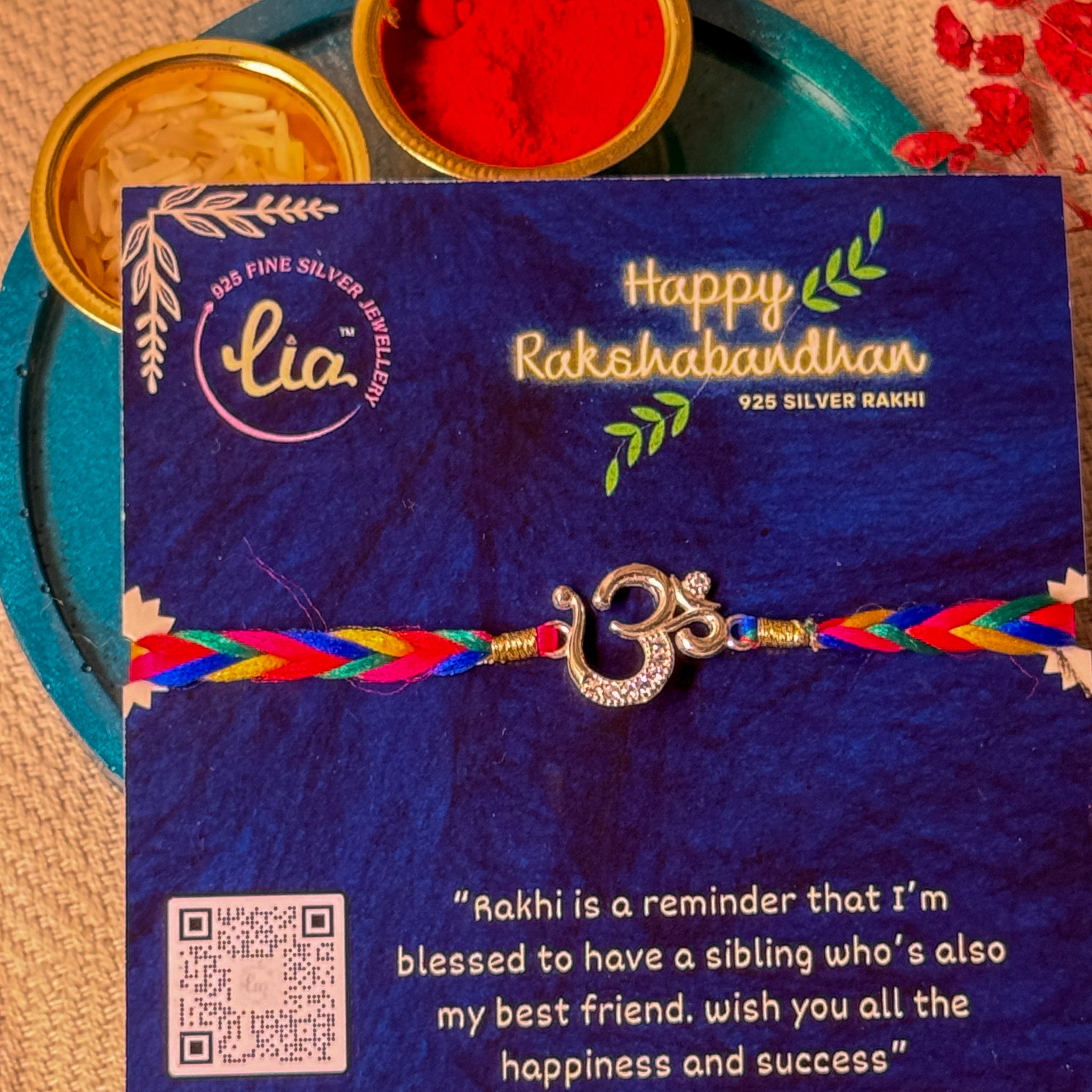 DESIGNER STUDDED AUM RAKHI