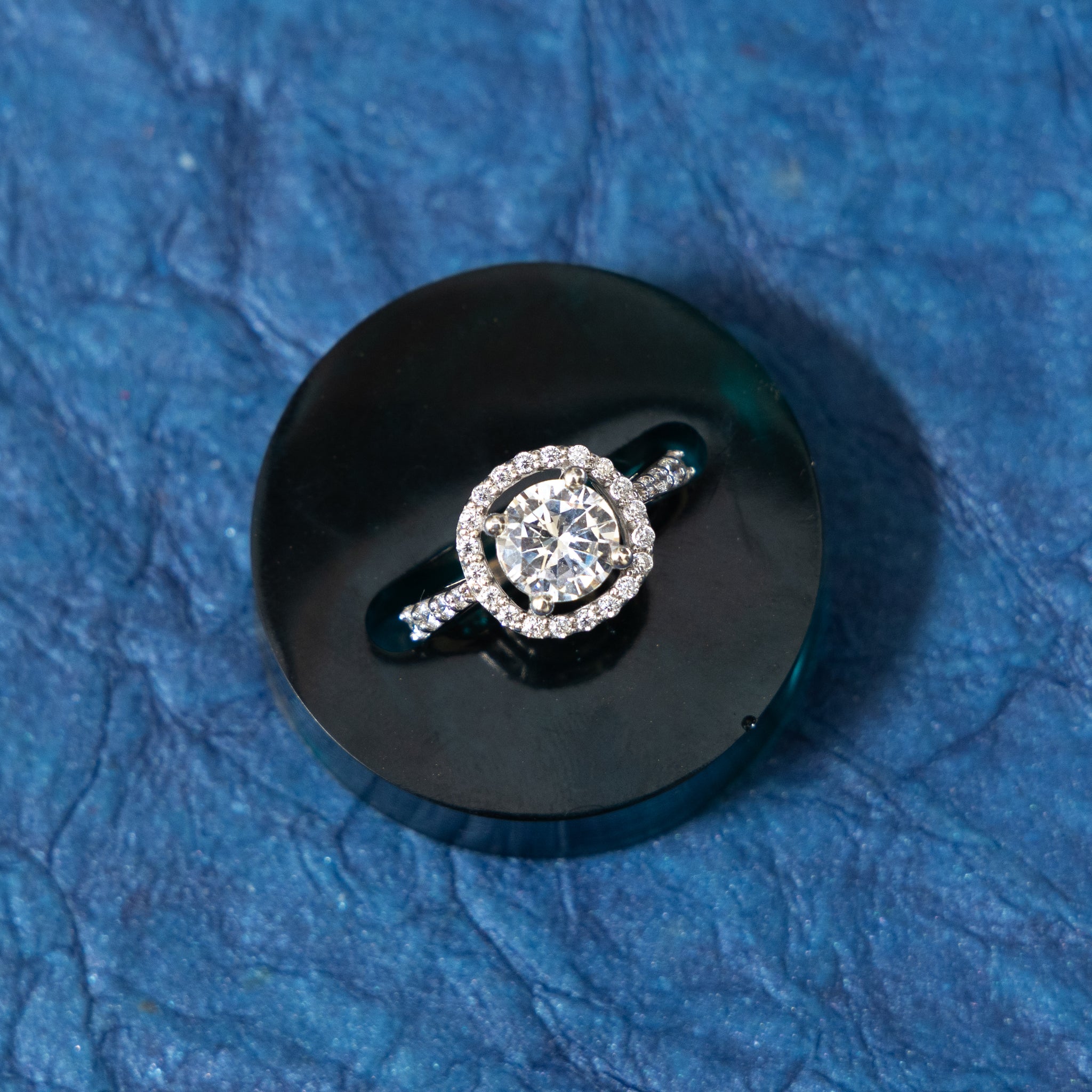 SILVER ROUND SOLITAIRE IN CUSHION SHAPE RING IN SINGLE STRING